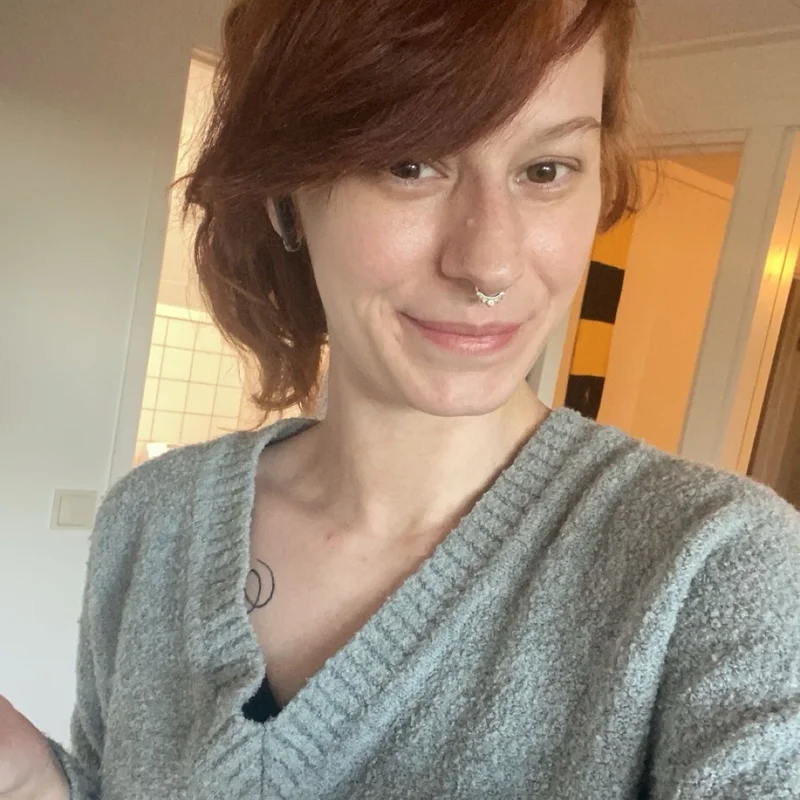 NIKKI B.